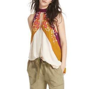 Free People cream, orange,purple tunic size medium